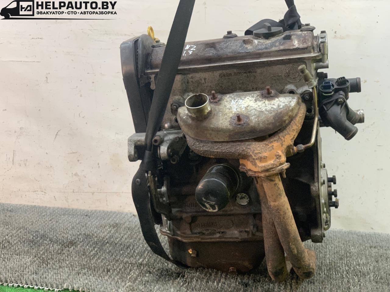 двигатель Volkswagen Golf 2 поколение 1986, 1.3 л., бензин, МКПП, синий, хетчбэк 5 дв., передний привод, NZ, 077229 - фото №1