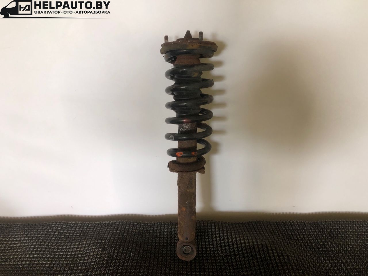 стойка передняя левая Kia Sorento 1 поколение 2005, 2.4 л., G4JS, бензин, МКПП, красный, внедорожник 5 дв., полный подключаемый привод - фото №1