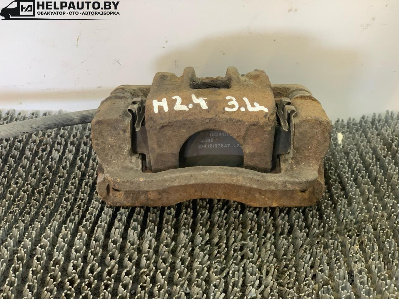 суппорт задний левый Hyundai Santa Fe 1 поколение (SM) 2001, 2.4 л., бензин, МКПП, черный, внедорожник 5 дв., передний привод - фото №1