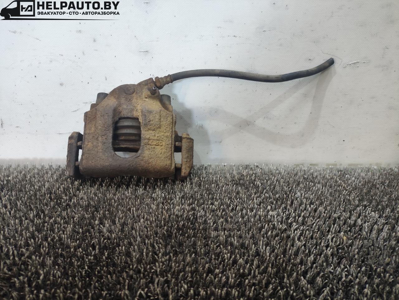 суппорт передний правый Kia Spectra 1 поколение 2000, 1.8 л., бензин, МКПП - фото №1