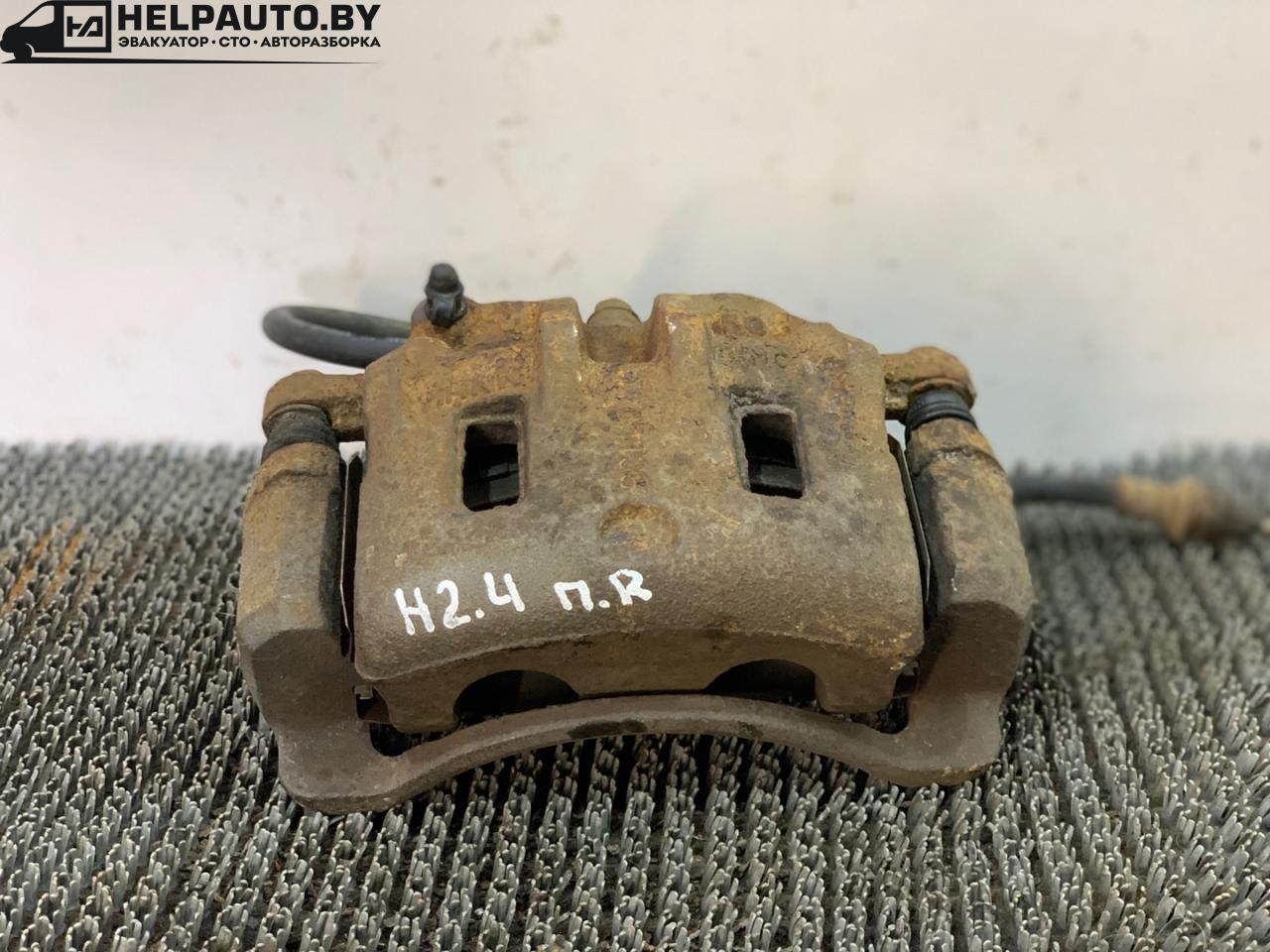 суппорт передний правый Hyundai Santa Fe 1 поколение (SM) 2001, 2.4 л., бензин, МКПП, черный, внедорожник 5 дв., передний привод - фото №1