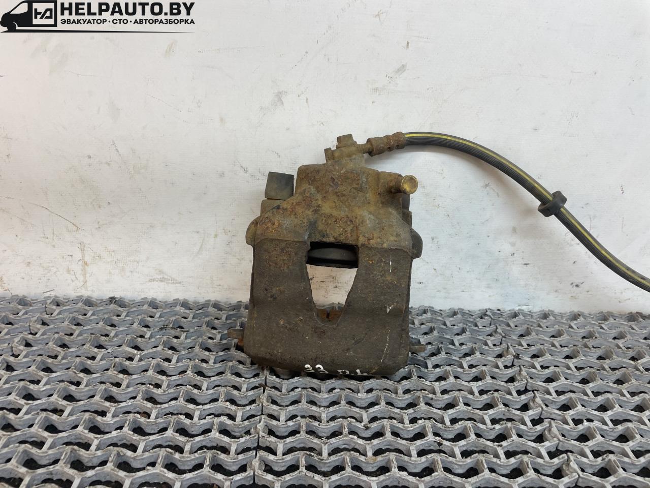 суппорт передний левый Volkswagen Jetta 4 поколение 2001, 2.0 л., AQY, бензин, МКПП, синий, седан, передний привод - фото №1