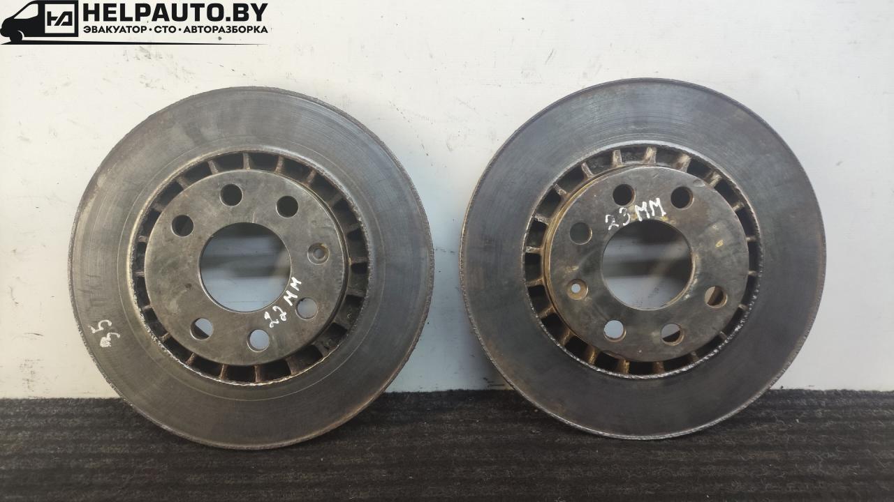 диск тормозной передний Opel Astra F 1994, 1.7 л., дизель, 5МКПП, зелёный, хетчбэк 5 дв., передний привод - фото №1