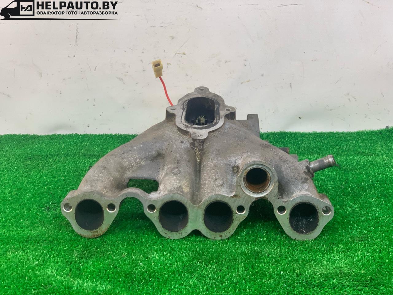 коллектор впускной Volkswagen Santana 1 поколение 1988, 1.6 л., бензин, синий, передний привод, 027129713 - фото №1
