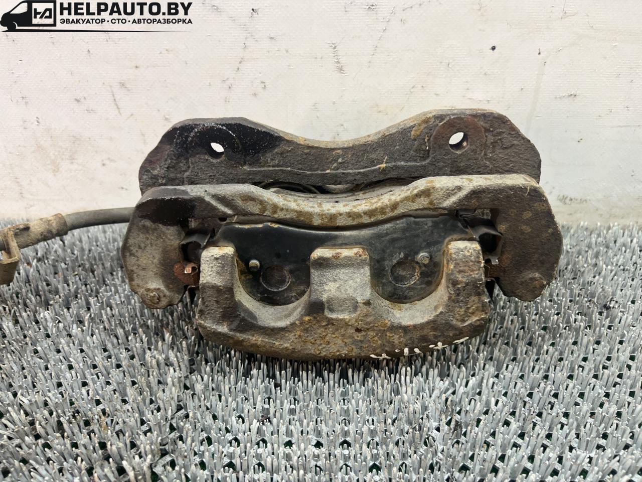 суппорт передний правый Hyundai Terracan 1 поколение 2003, 2.5 л., D4BH, дизель, АКПП, серебристый, внедорожник 5 дв., полный подключаемый привод - фото №1