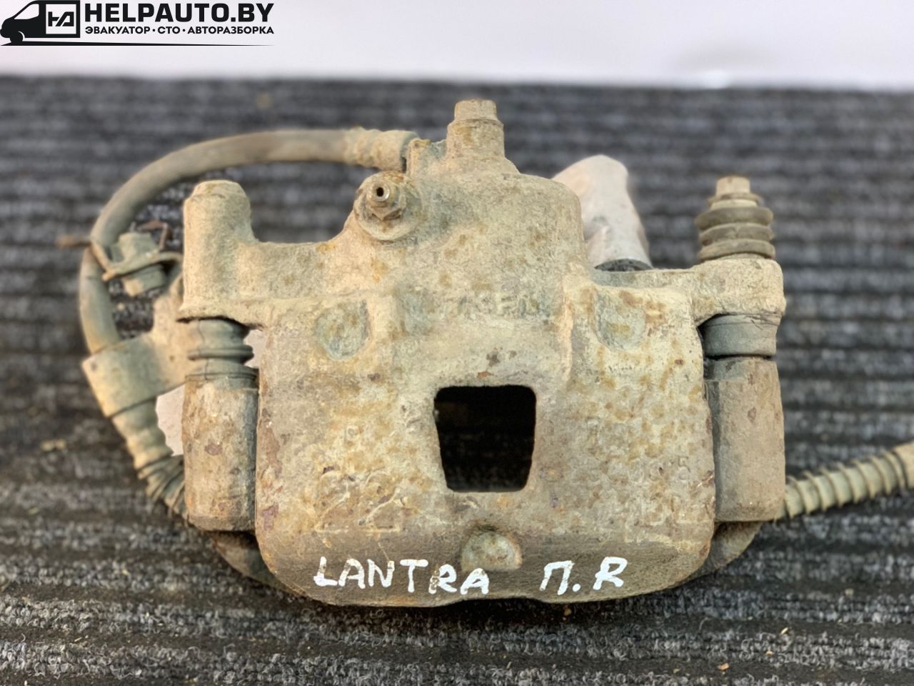 суппорт передний правый Hyundai Lantra J2 1997, 1.5 л., G4EK, бензин, МКПП, бордовый, универсал, передний привод - фото №1