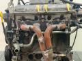 коллектор выпускной Mazda 323 6 поколение 1998, 1.5 л., бензин, МКПП, синий, хетчбэк 3 дв., передний привод - фото №2