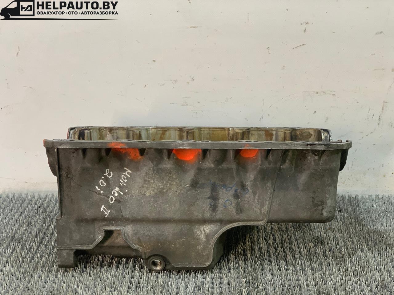 масляный поддон Ford Mondeo 2 поколение 1997, 2.0 л., бензин, МКПП, черный, универсал, передний привод, 938M6676 - фото №1