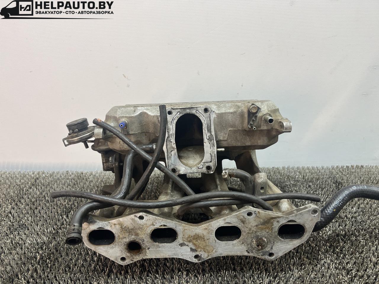коллектор впускной Kia Sportage 1 поколение 1999, 2.0 л., FE (16V), бензин, МКПП, синий, внедорожник 5 дв., полный подключаемый привод - фото №1