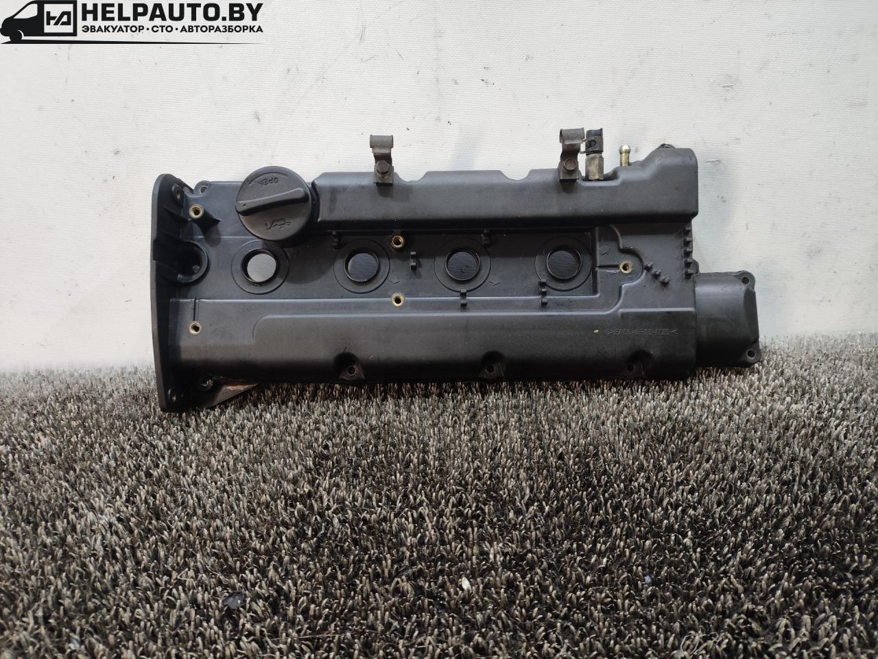 клапанная крышка Hyundai Coupe RD 1998, 2.0 л., бензин, МКПП, бордовый, купе, передний привод, 22410-23001 - фото №1