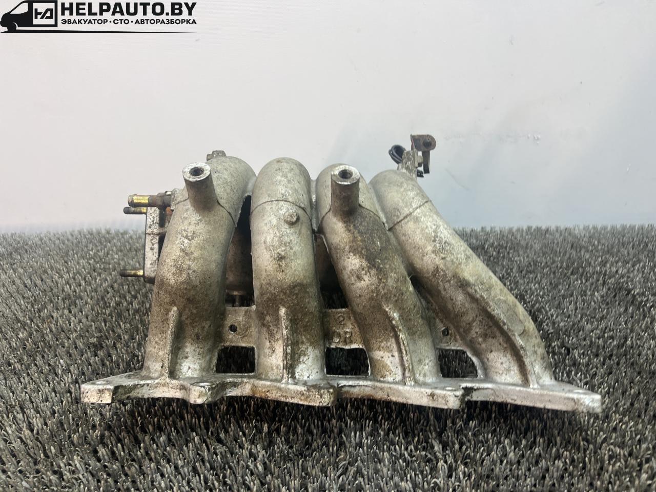 коллектор впускной Hyundai Coupe RD 1998, 2.0 л., бензин, МКПП, бордовый, купе, передний привод - фото №1