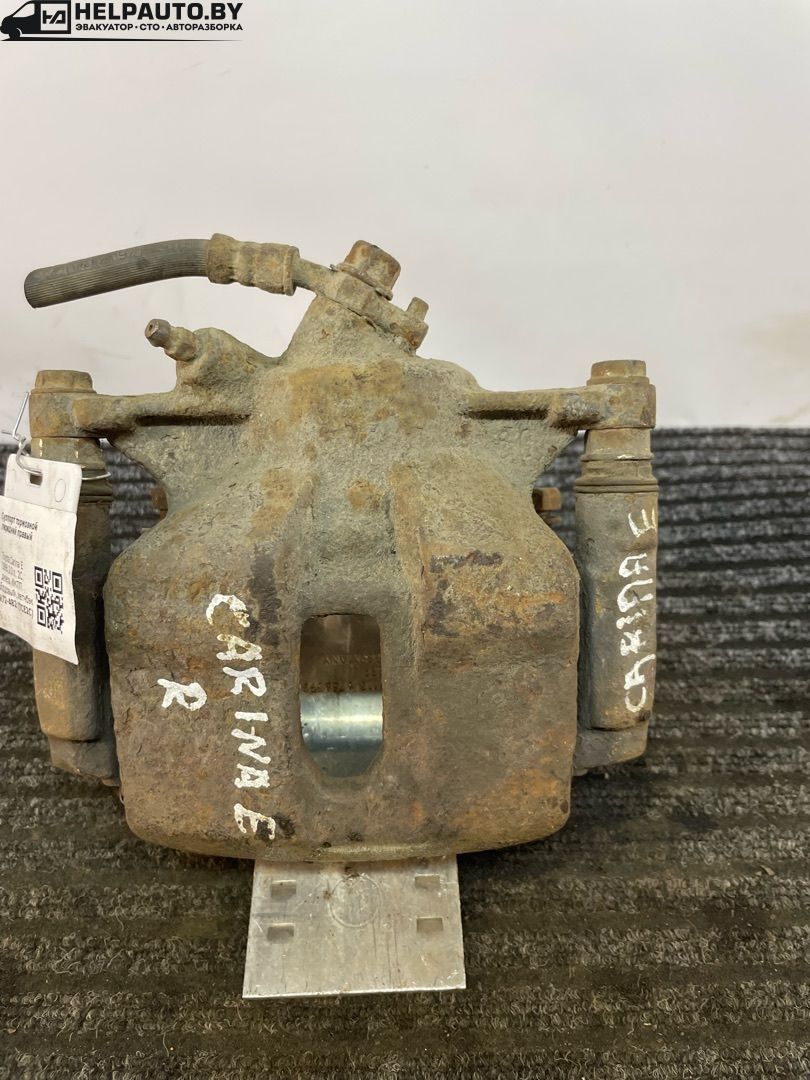 суппорт передний правый Toyota Carina E 1 поколение T190 1995, 2.0 л., 2C, дизель, МКПП, бордовый, хетчбэк 5 дв., передний привод - фото №1