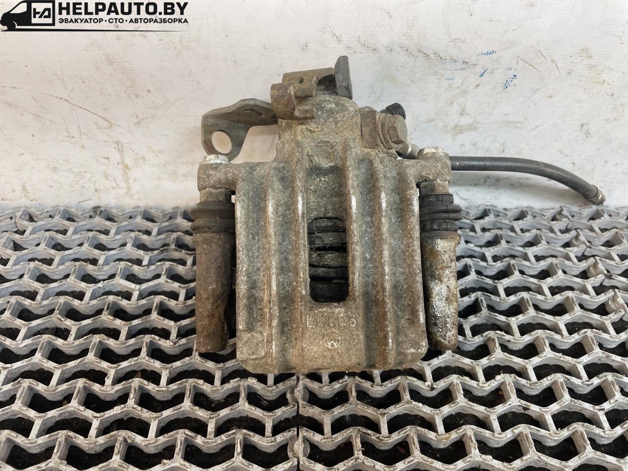 суппорт задний правый Volkswagen Jetta 4 поколение 2001, 2.0 л., AQY, бензин, МКПП, синий, седан, передний привод - фото №1