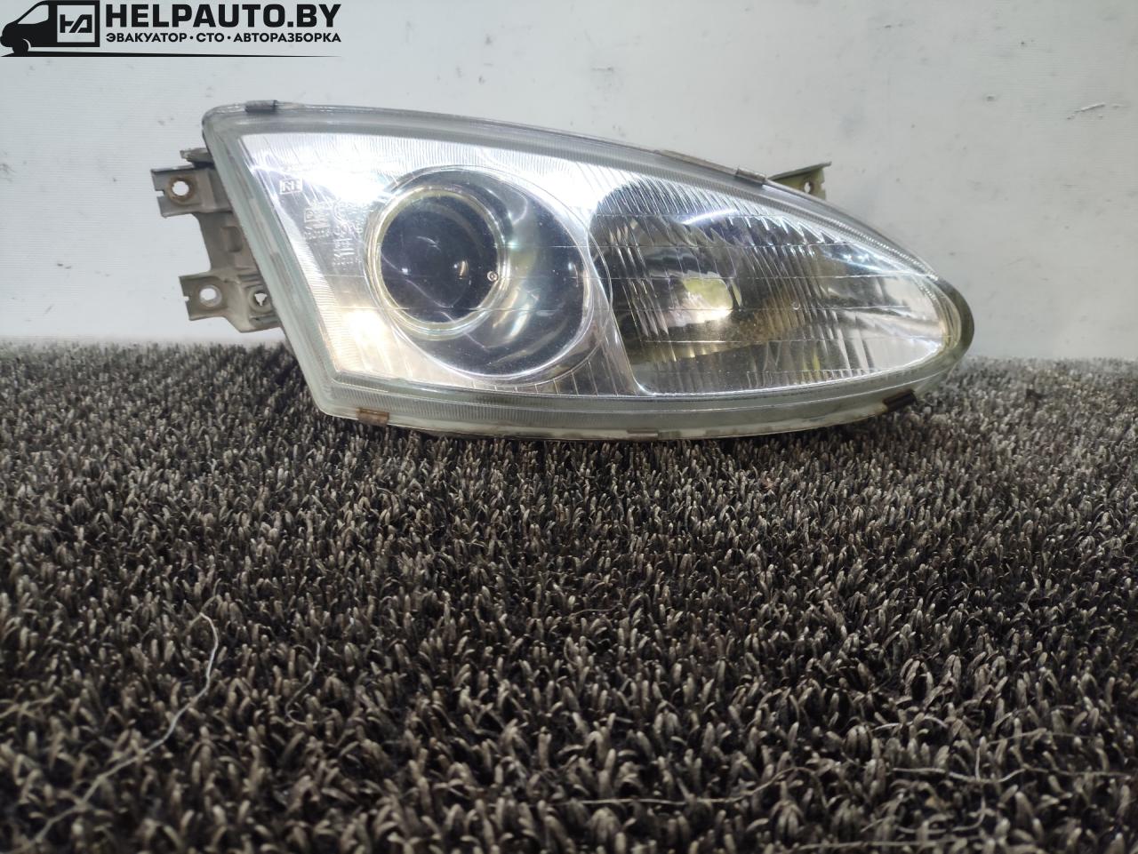 фара правая Hyundai Coupe RD 1997, 2.0 л., бензин, МКПП, серебристый, купе, передний привод, 0101160019 - фото №1