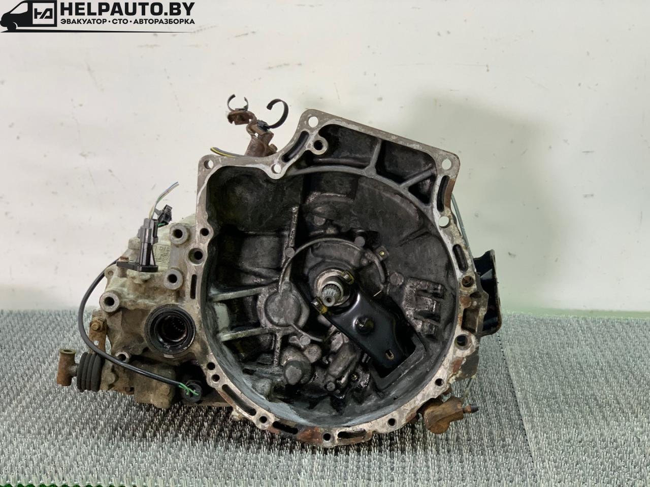 КПП механическая (МКПП) Mazda 323 6 поколение 1998, 1.5 л., бензин, МКПП, синий, хетчбэк 3 дв., передний привод, F5D2 - фото №1