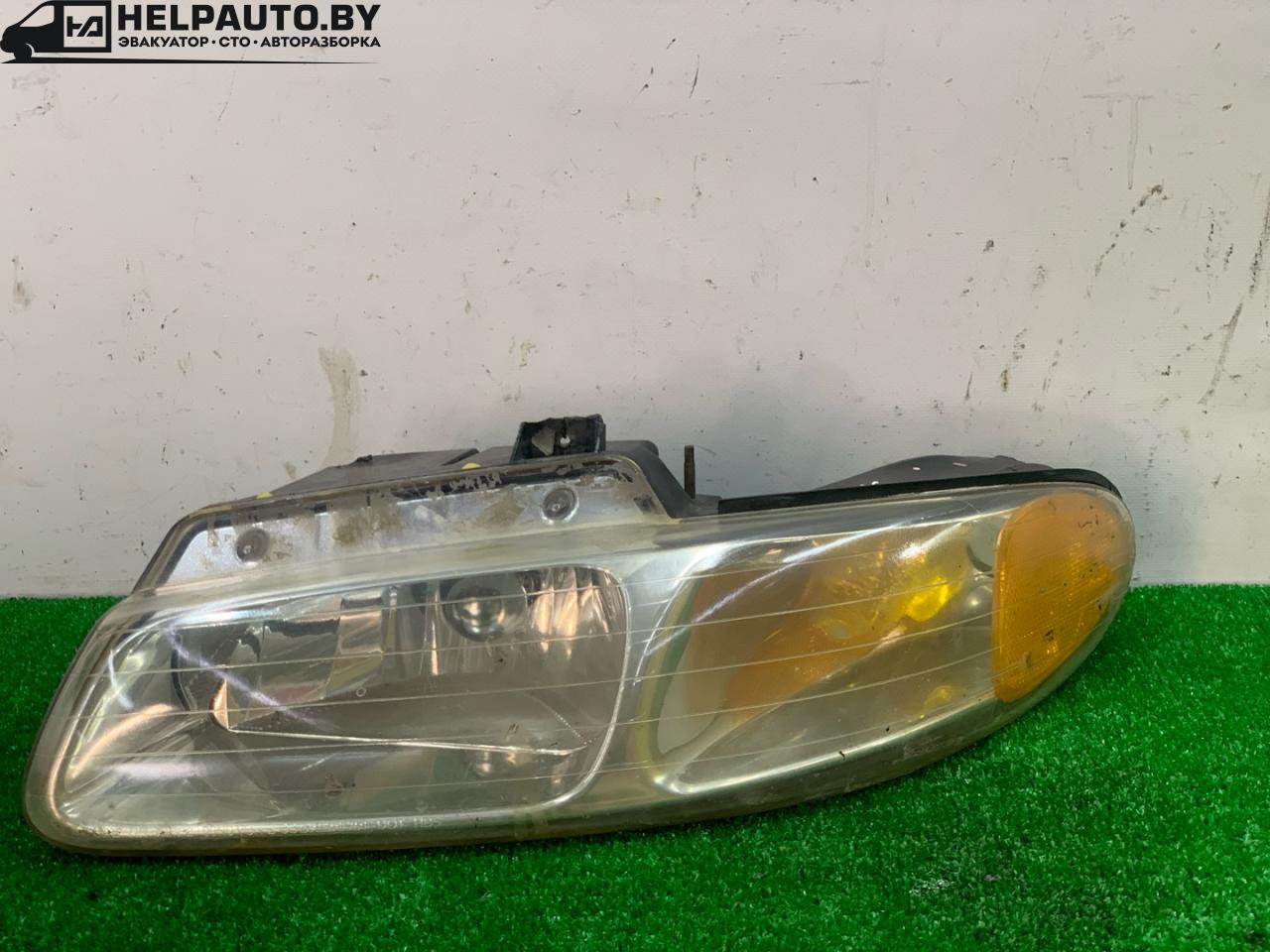 фара левая Dodge Caravan 3 поколение RG 1999, 2.4 л., EDZ, бензин, АКПП, темно зеленый, передний привод - фото №1