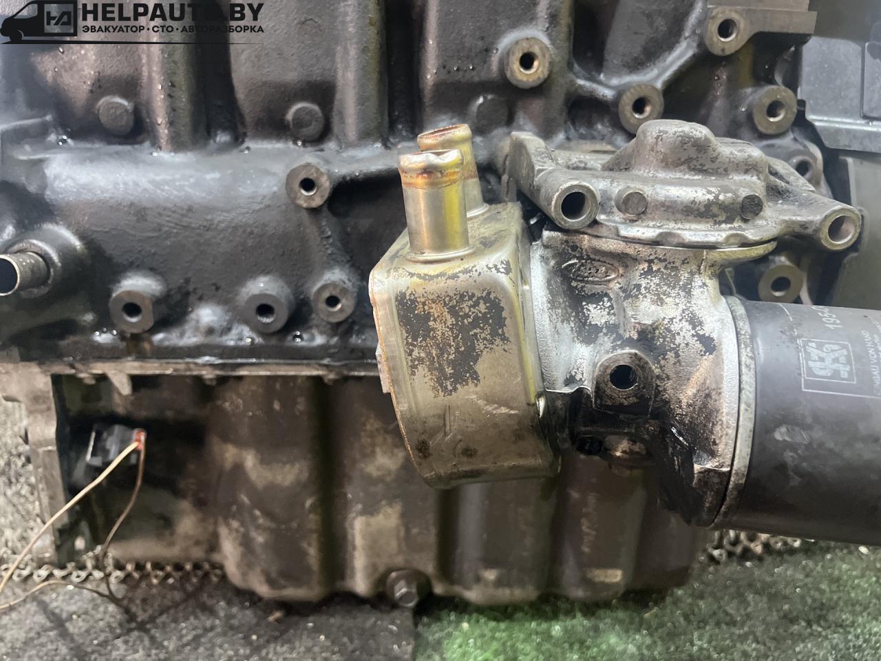 теплообменник масляного фильтра Ford Mondeo 1 поколение (1993 - 1996), 1.8 л., RFN, дизель, МКПП, передний привод, 93FF-6B856-AA - фото №1
