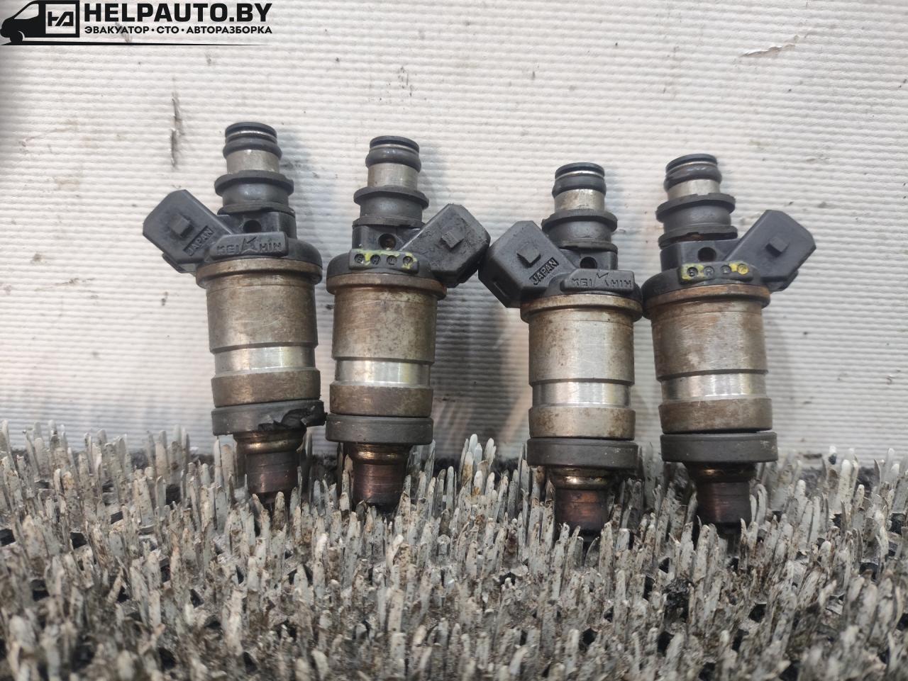 форсунка Rover 600 Series 1 поколение 1994, 2.0 л., бензин, МКПП, зелёный, седан, передний привод, 5HL7 - фото №1