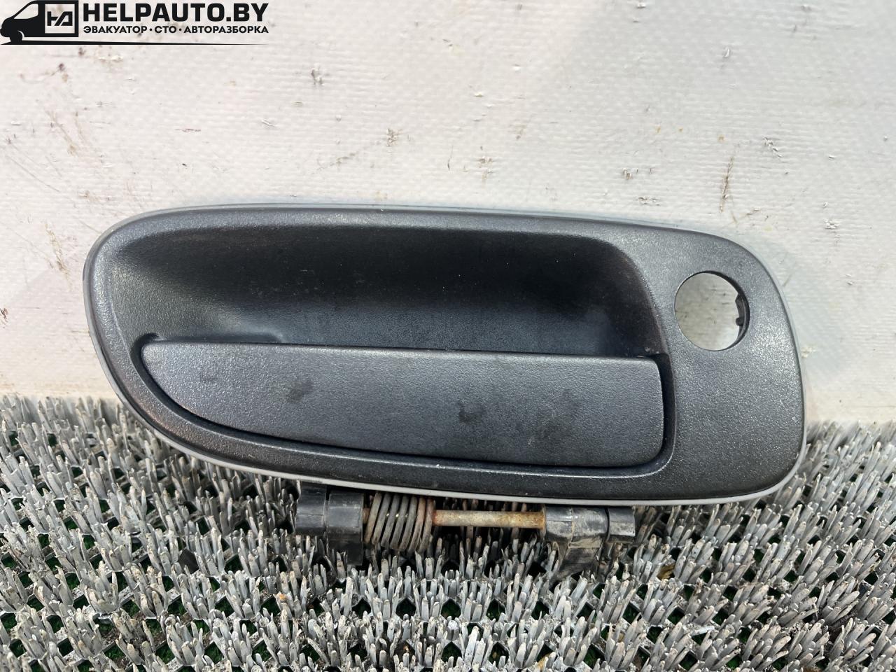 ручка наружная Toyota Carina E 1 поколение T190 1995, 1.6 л., 4A-FE, бензин, МКПП, зелёный, хетчбэк 5 дв., передний привод, 69210-05010 - фото №1