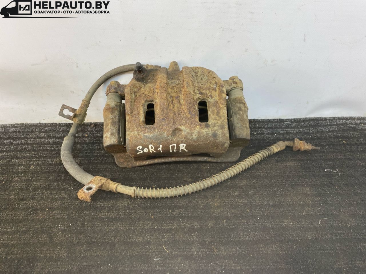 суппорт передний правый Kia Sorento 1 поколение 2004, 2.5 л., CRDi, D4CB, дизель, АКПП, серебристый, внедорожник 5 дв., полный подключаемый привод - фото №1