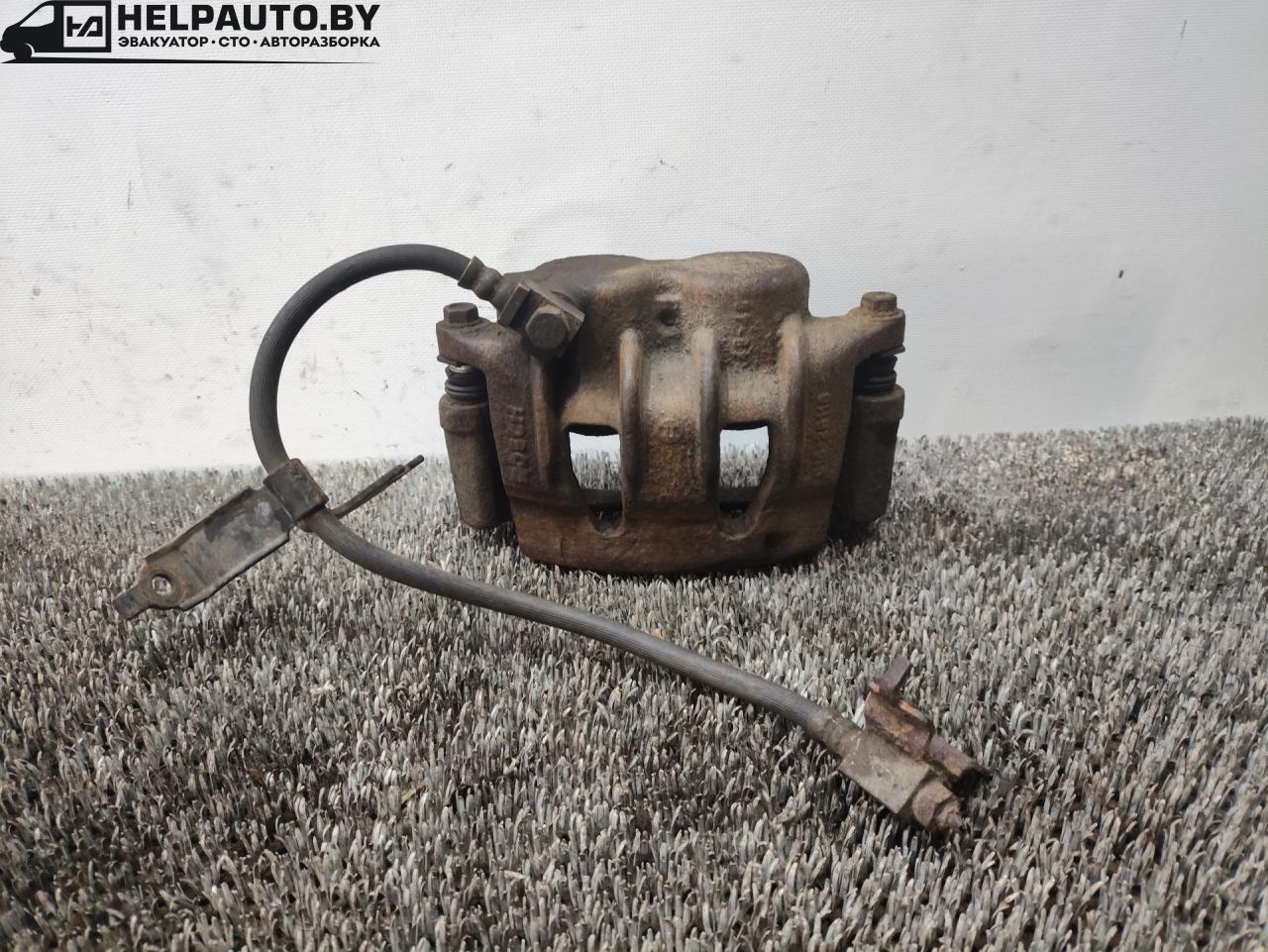 суппорт передний правый Ford Transit 6 поколение (2000 - 2006), 2.4 л., i, дизель, МКПП, микроавтобус, задний привод - фото №1