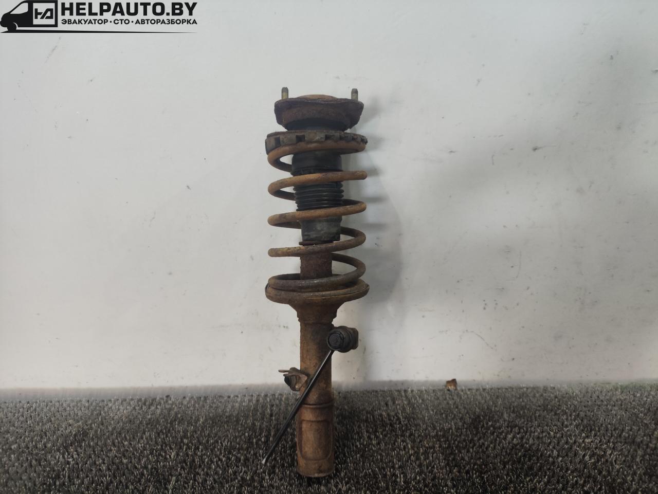 стойка передняя правая Kia Spectra 1 поколение 2000, 1.8 л., бензин, МКПП - фото №1