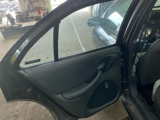 обшивка двери задняя левая Pontiac Sunfire 1 поколение 1999, 2.2 л., бензин, АКПП, черный, передний привод, LIKVIDACIYA, SKLADA