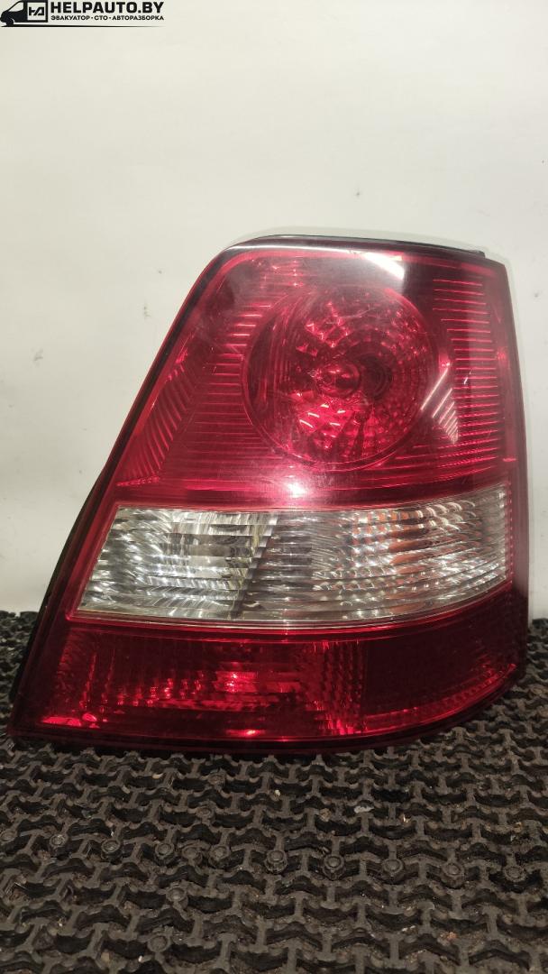 фонарь задний правый Kia Sorento 1 поколение 2006, 2.5 л., D4CB, дизель, МКПП, серебристый, внедорожник 5 дв., полный подключаемый привод, 92402-3E0 - фото №1