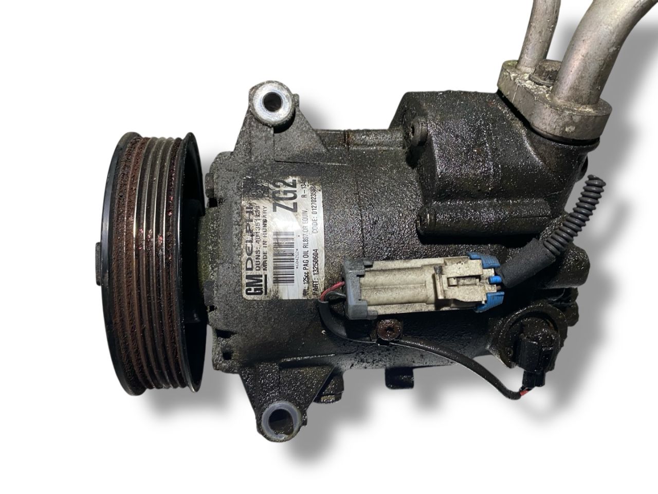 компрессор кондиционера Opel Astra J 2010, 1.6 л., A 16 XER, бензин, 5МКПП, saphirschwarz / gbg, хетчбэк 5 дв., передний привод, правый руль, 13250604, ZG2 - фото №1
