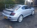 спойлер Hyundai Coupe 2 поколение [рестайлинг] GK 2005, 2.7 л., MPI, G6BA, бензин, 6МКПП, pewter / tw, купе, передний привод, правый руль, 87220-2C000 - фото №4