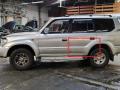 молдинг двери задней левой Toyota Land Cruiser Prado 2 поколение J90 1998, 3.0 л., TD, 1KZ-TE, дизель, АКПП, silver / k73, внедорожник 5 дв., полный привод, правый руль, 75076-60010 - фото №3