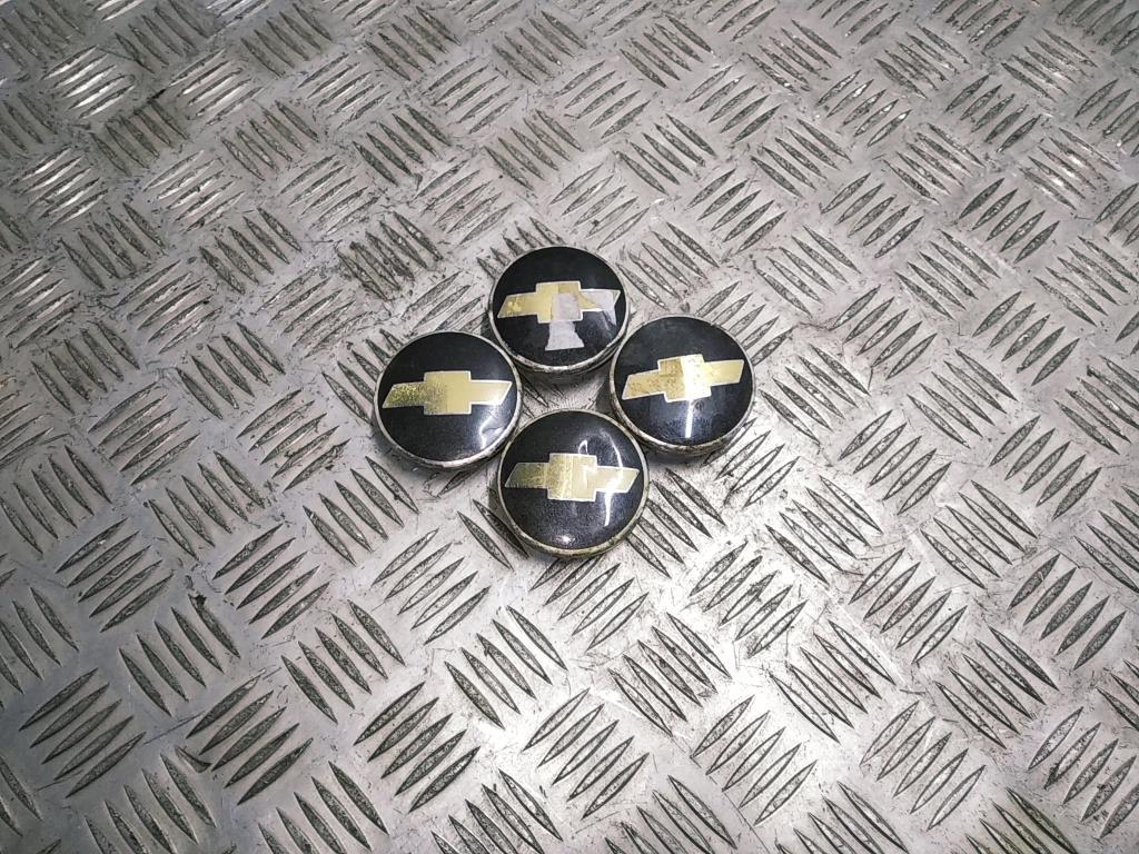 колпачок литого диска Chevrolet Lacetti 1 поколение 2007, 1.6 л., i, F16D3, бензин, АКПП, mint green / 35u, хетчбэк 5 дв., передний привод, правый руль, 96452311 - фото №1