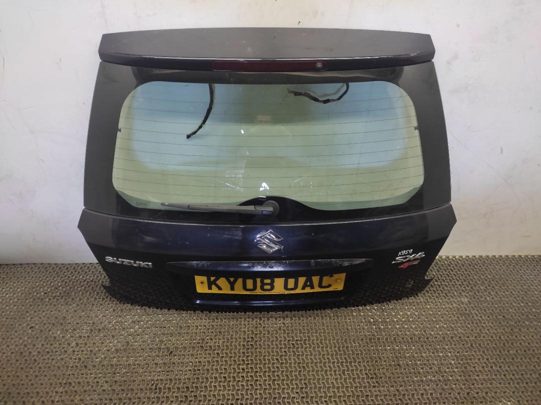 крышка багажника (дверь 3-5) Suzuki SX4 1 поколение 2008, 1.9 л., DDiS, D19AA, дизель, 6МКПП, чёрный, хетчбэк 5 дв., полный привод, правый руль, 69100-79J00 - фото №1
