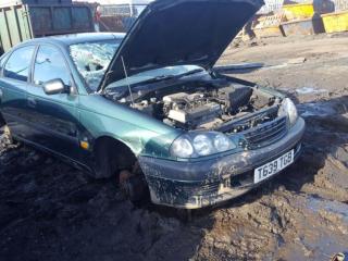 Toyota Avensis 1 поколение (T220)