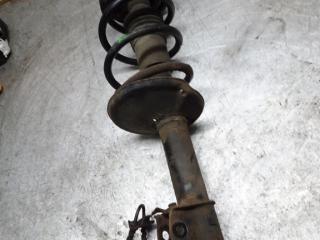 стойка передняя левая Dacia Sandero 1 поколение 2009, 1.4 л., бензин, МКПП, хетчбэк 5 дв.