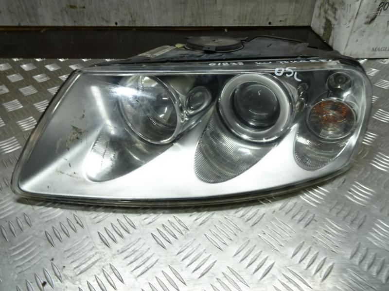 фара левая Volkswagen Touareg 1 поколение 2005, 3.0 л., дизель, МКПП, внедорожник 5 дв., 7L6941015CE - фото №1