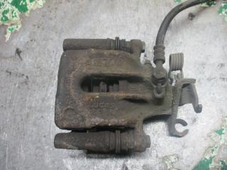 суппорт задний левый Mitsubishi Carisma 1 поколение [рестайлинг] 2002, 1.6 л., i, бензин, МКПП, хетчбэк 5 дв.