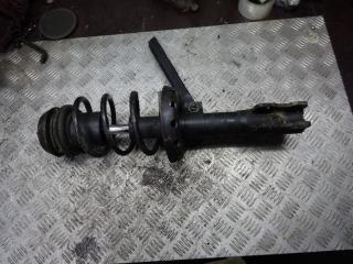 стойка передняя левая Mazda 323P BJ 1999, 1.6 л., бензин, МКПП, хетчбэк 5 дв.