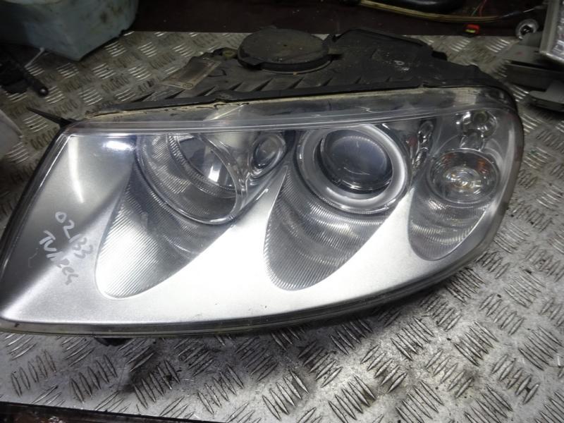 фара левая Volkswagen Touareg 1 поколение 2005, 2.5 л., дизель, АКПП, внедорожник 5 дв., 7L6941015CE - фото №1