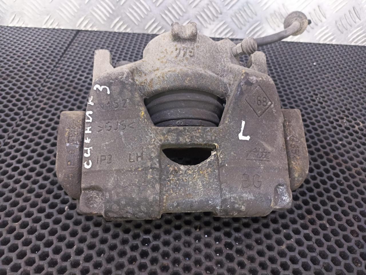 суппорт передний левый Renault Scenic 3 поколение 2012, 410111495R - фото №1