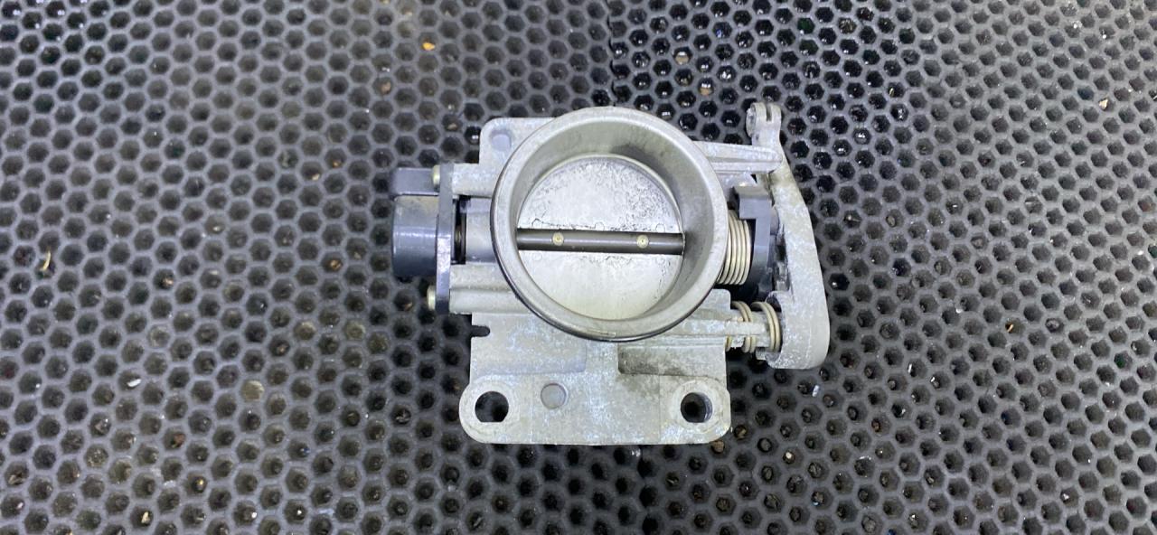 заслонка дроссельная Lada Largus 1 поколение (2012 - 2026), 7700875435 - фото №1