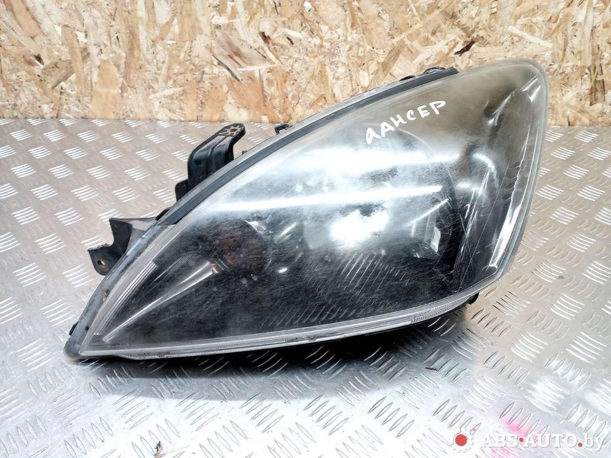 фара левая Mitsubishi Lancer 9 поколение 2007, P3524, 90738200 - фото №1