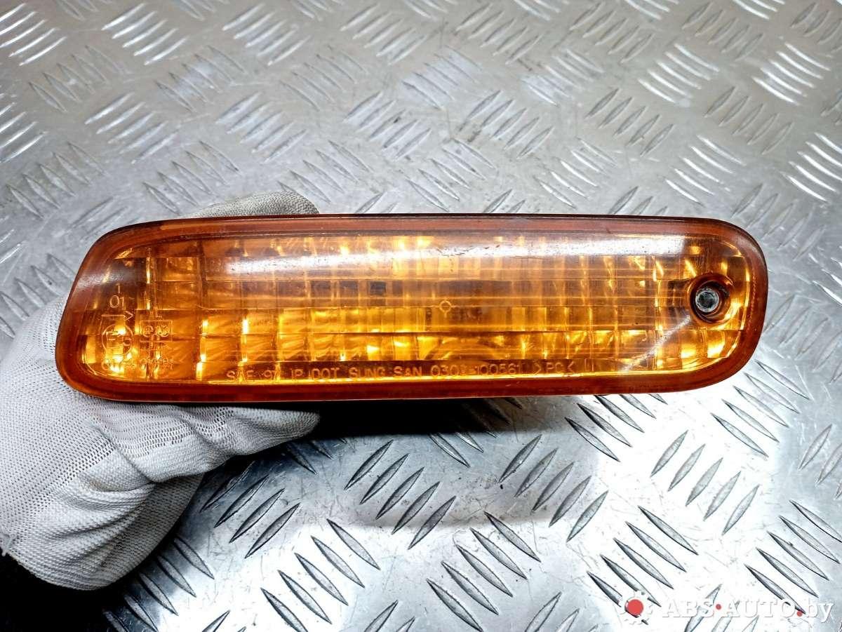 поворотник левый Daewoo Leganza 1 поколение 2002, 0303000837 - фото №1