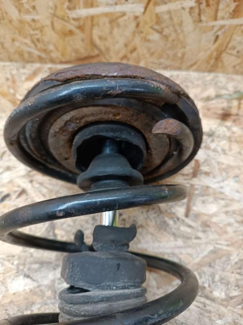 стойка передняя левая Nissan Primera P12 2004, 2.2 л., дизель, МКПП, хетчбэк 5 дв. - фото №1