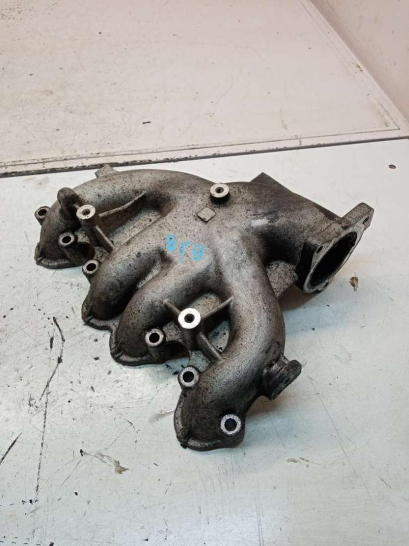 коллектор впускной Volkswagen Caddy 3 поколение 2008, 1.9 л., BJB, дизель, МКПП, белый, 03G129713, 130207N2 - фото №1