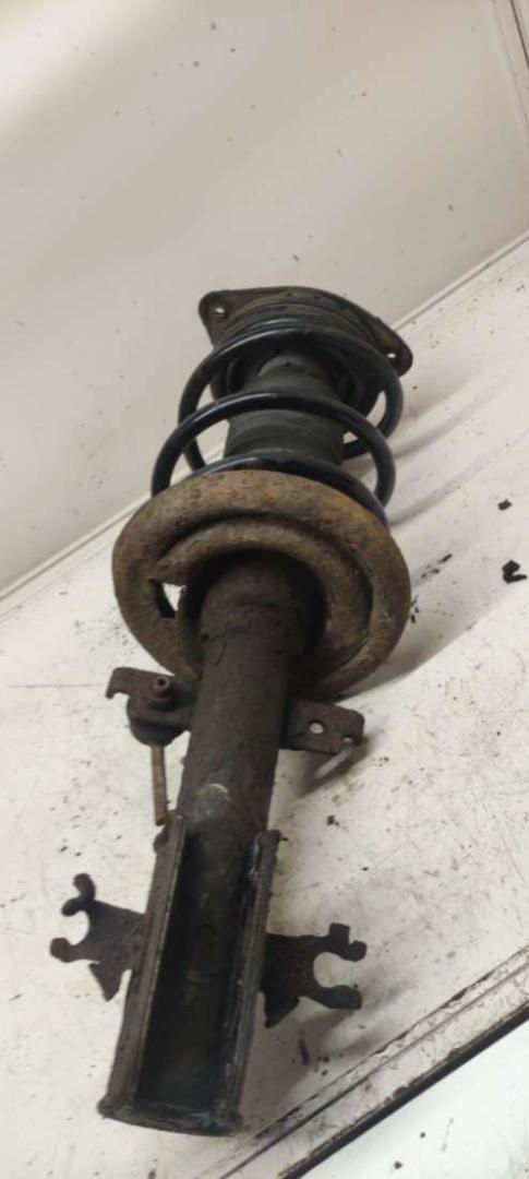 стойка передняя Renault Laguna 3 поколение 2009, 2.0 л., дизель, МКПП, хетчбэк 5 дв. - фото №1