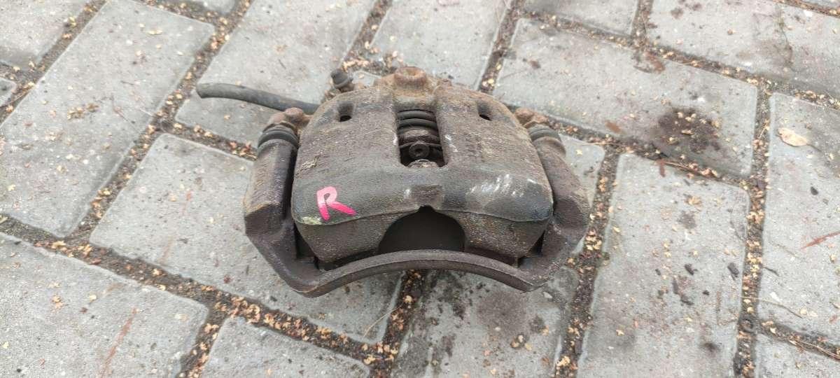 суппорт передний правый Smart Forfour 1 поколение 2005, 1.5 л., дизель, МКПП, 323251545 - фото №1