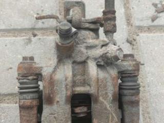 суппорт задний левый Nissan Almera N16 2002, 1.5 л., бензин, МКПП, седан