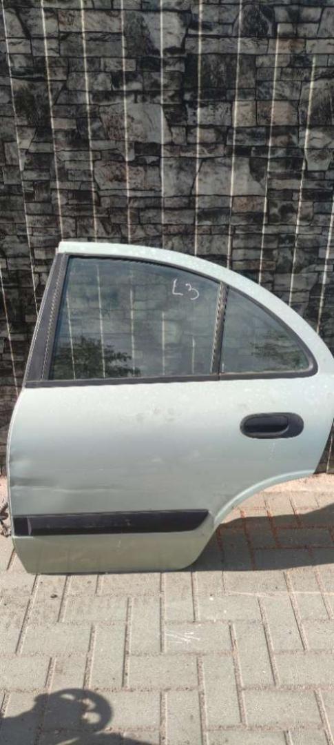 дверь задняя левая Nissan Almera N16 2002, 1.5 л., бензин, МКПП, седан - фото №1