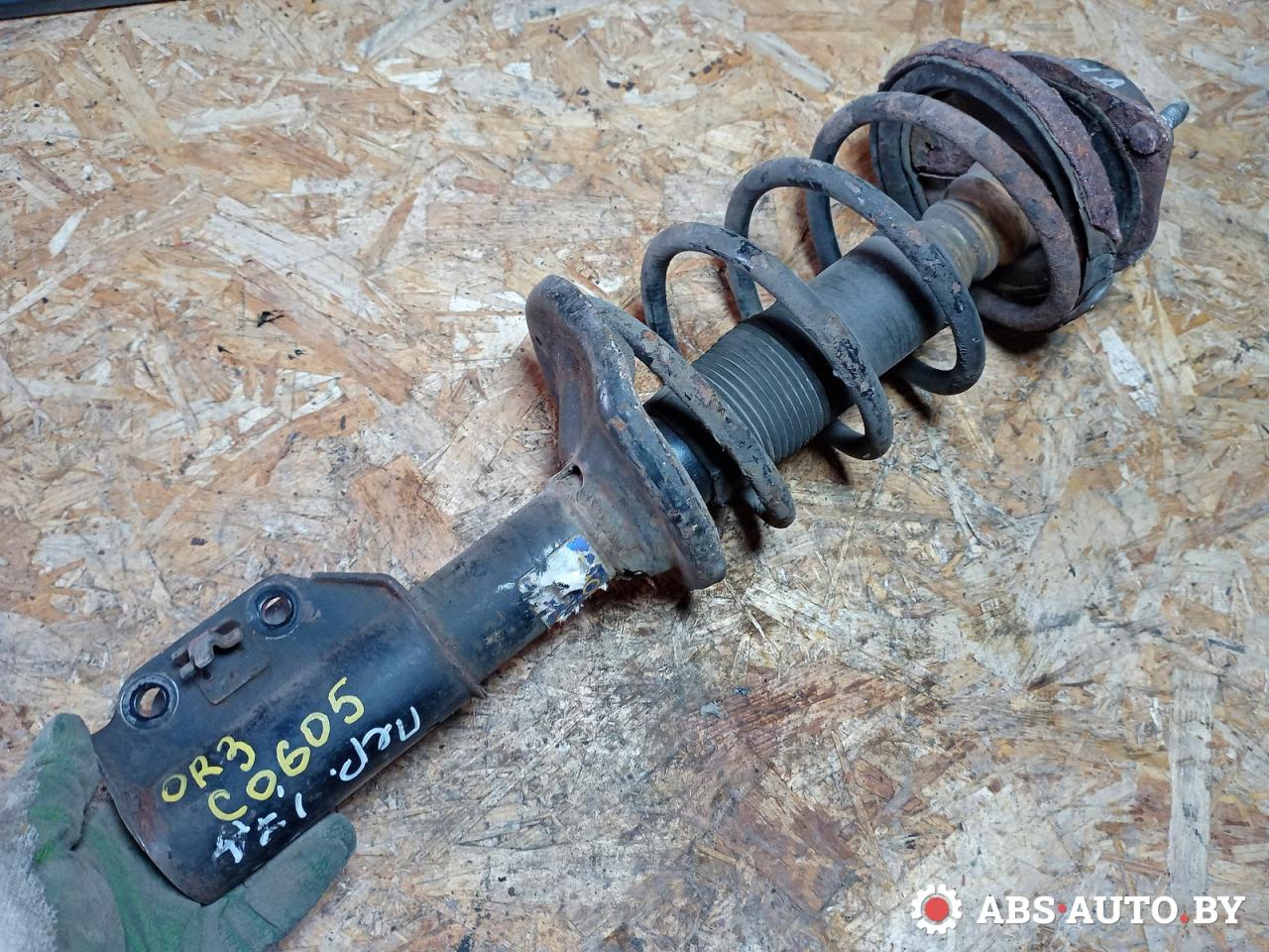 стойка передняя левая Mazda 323F BG 1994, 1.7 л., дизель, 11231L - фото №1